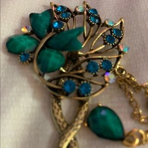 Turquoise, blue, white and gold updo hair piece.